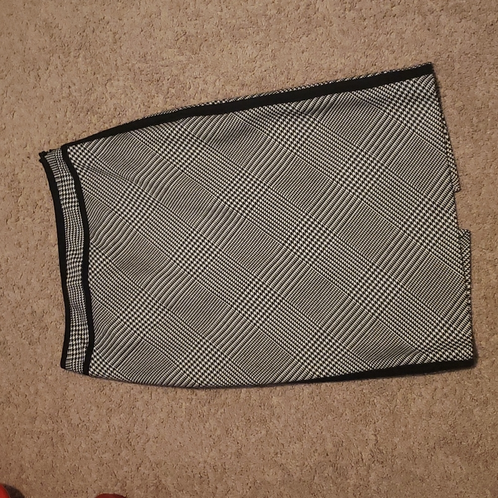 Pencil skirt with a little slit in the back